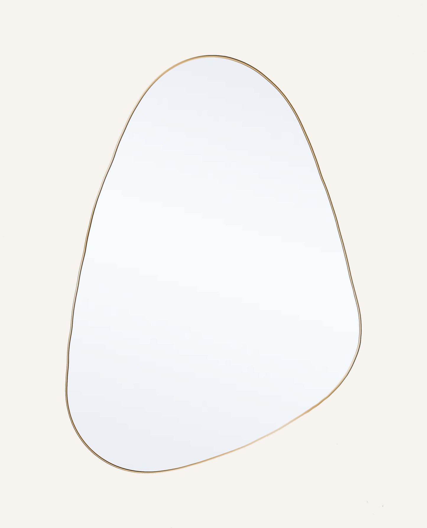 Miroir irrégulier doré